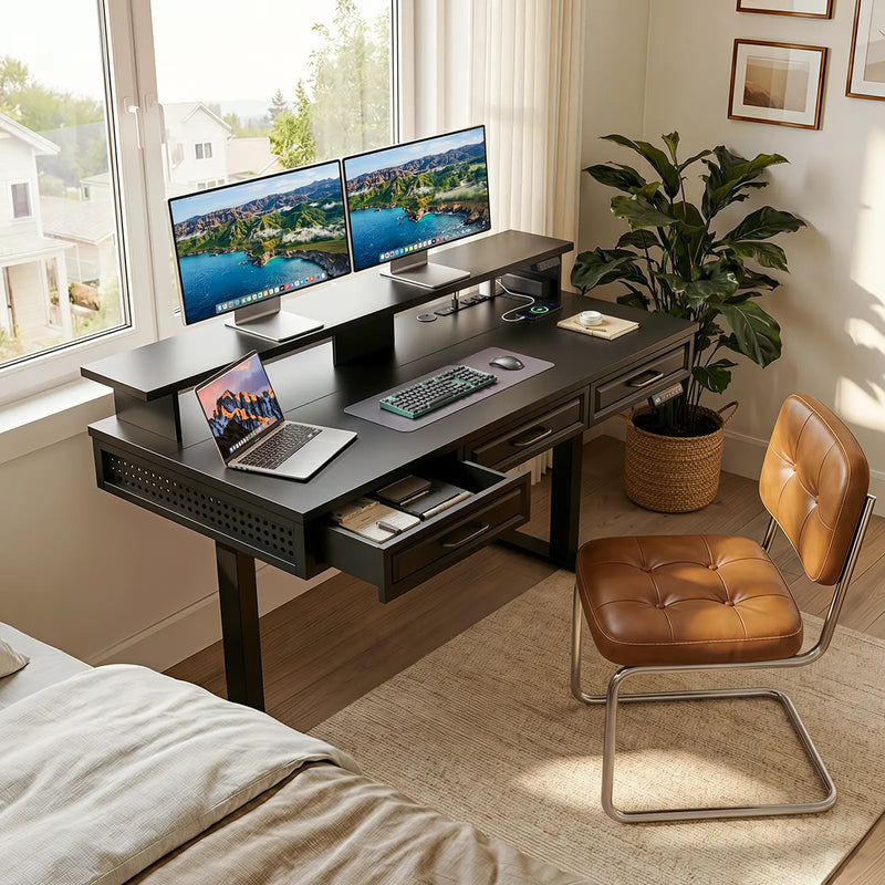 Black OffiGo standing desk with monitor shelf, built-in drawers, dual monitors, and clean compact bedroom office setup.