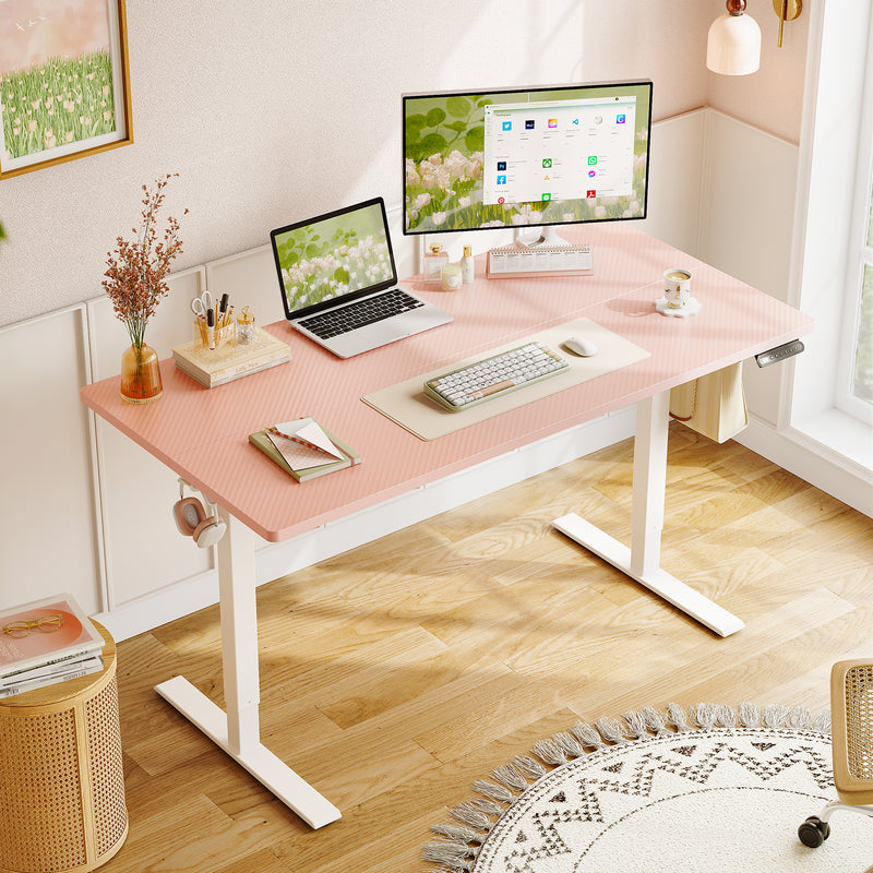 This is OffiGo pink standing desk designed for women, suitable for home office work and daily use.