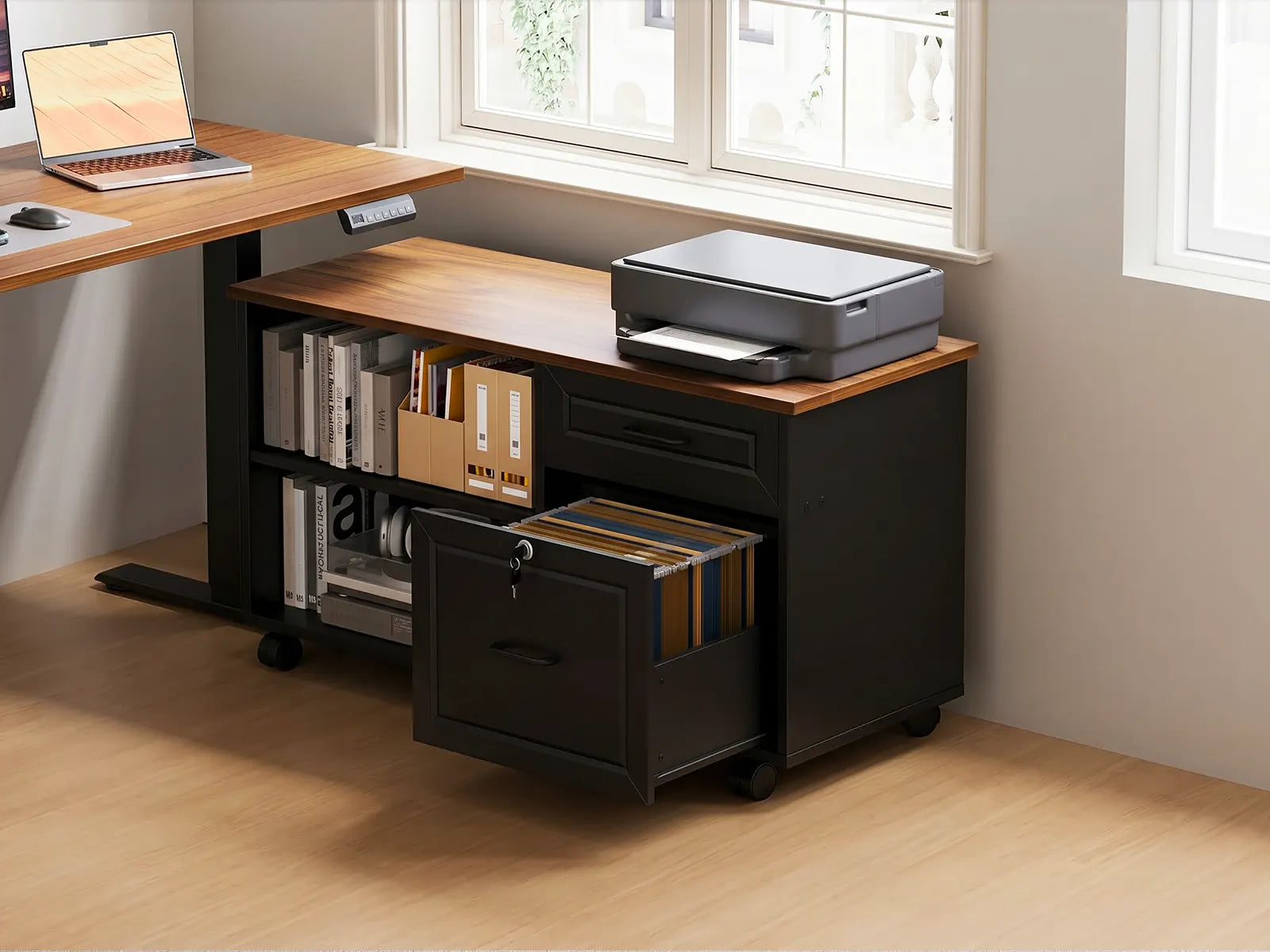 Black and wood side cabinet under a standing desk, holding files, folders, and a printer in a modern home office setup.