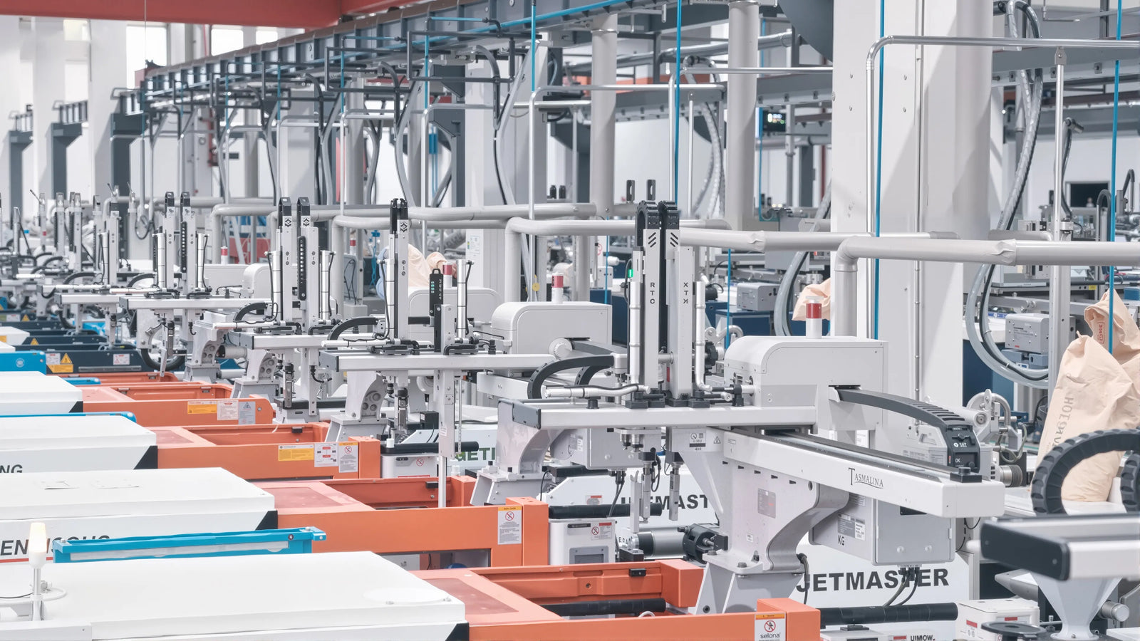Smart factory production line featuring automated industrial machinery and scalable manufacturing systems for modern office furniture production.