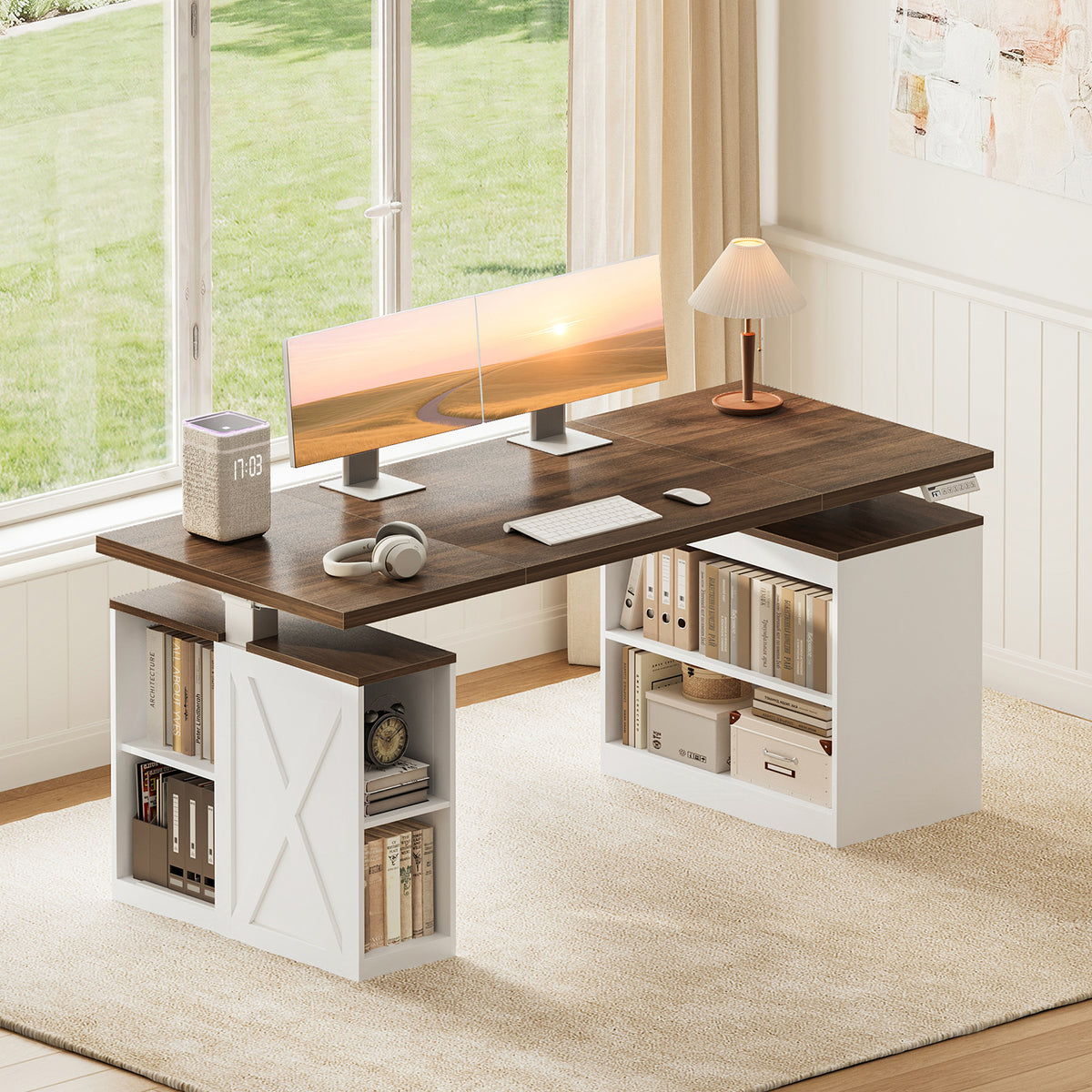 OffiGo 55-inch farmhouse standing desk with a walnut-brown desktop, white storage legs and an X-brace decorative panel, arranged beside a bright window with dual monitors and a lamp, headphones and organized open shelves.