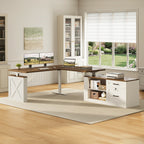 OffiGo 63-inch farmhouse L-shaped standing desk with a walnut-brown desktop, white X-brace side panel and white cabinet with open shelves and drawers, arranged in a bright farmhouse home office with dual monitors, a laptop and a printer beside white bookcases.