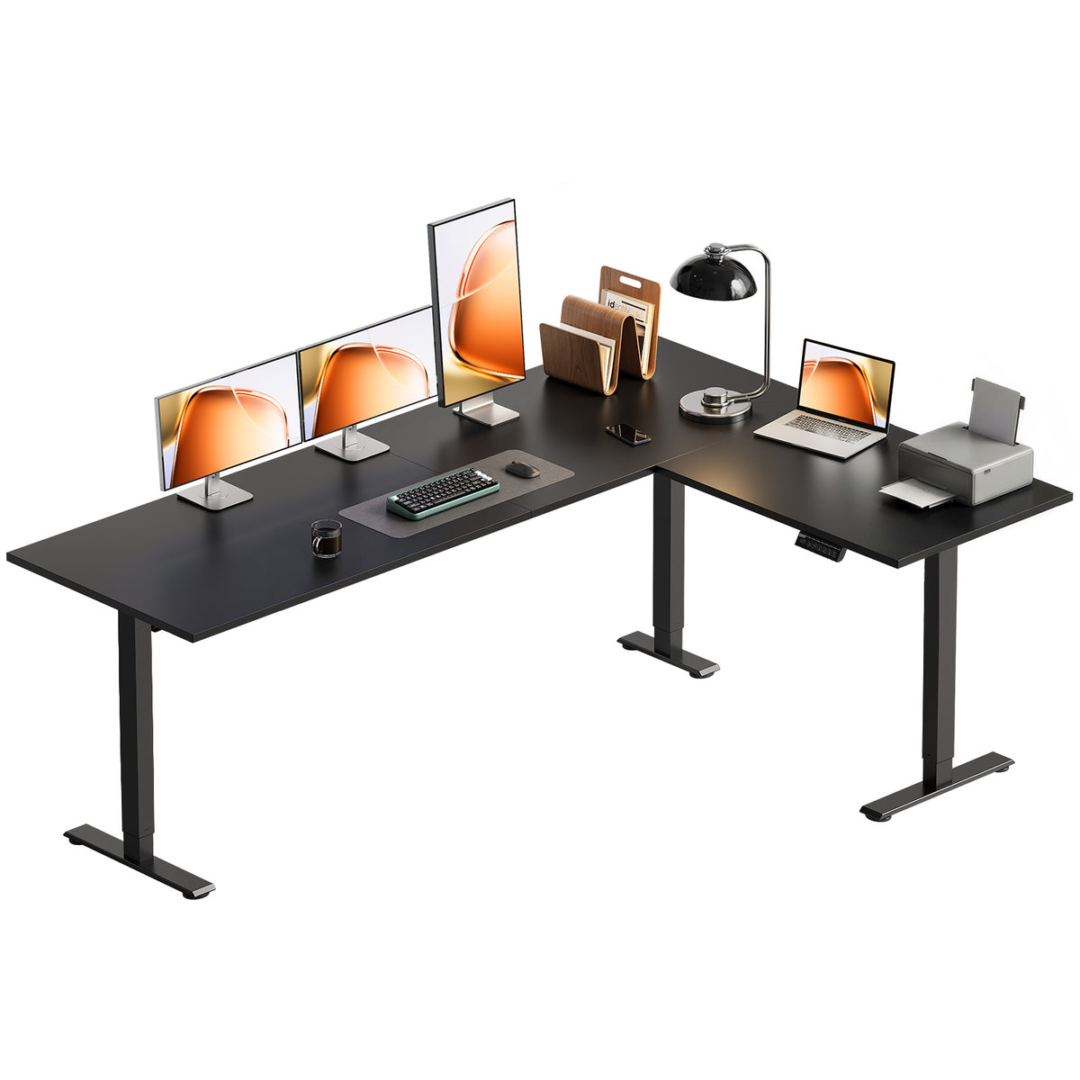 OffiGo 71-inch black L-shaped electric standing desk with three monitors, a laptop and a printer on its spacious corner desktop.