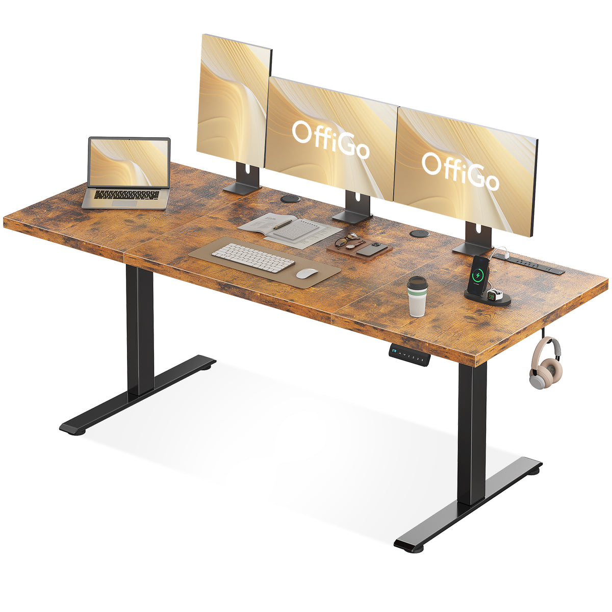OffiGo 79-inch rustic brown executive standing desk with a three-panel wood-grain desktop, three monitors, a laptop and a black frame.