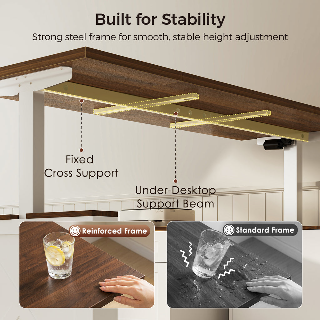 Underside of an OffiGo walnut-brown farmhouse standing desk, showing a fixed cross support and under-desktop support beam on the white frame, with reinforced and standard frame comparisons.